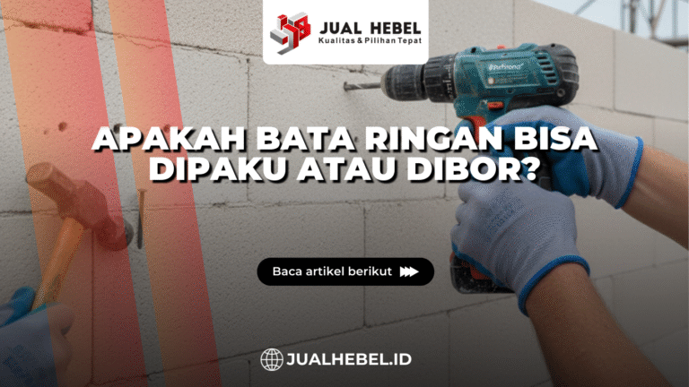 pekerja mengebor dan memasang paku pada dinding bata ringan saat proses pemasangan